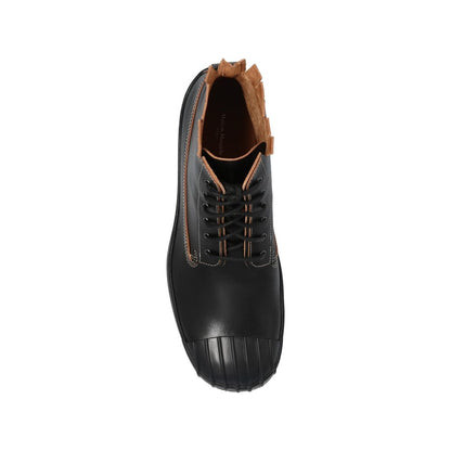 Maison Margiela Leather High-Top Sneakers by Maison Margiela