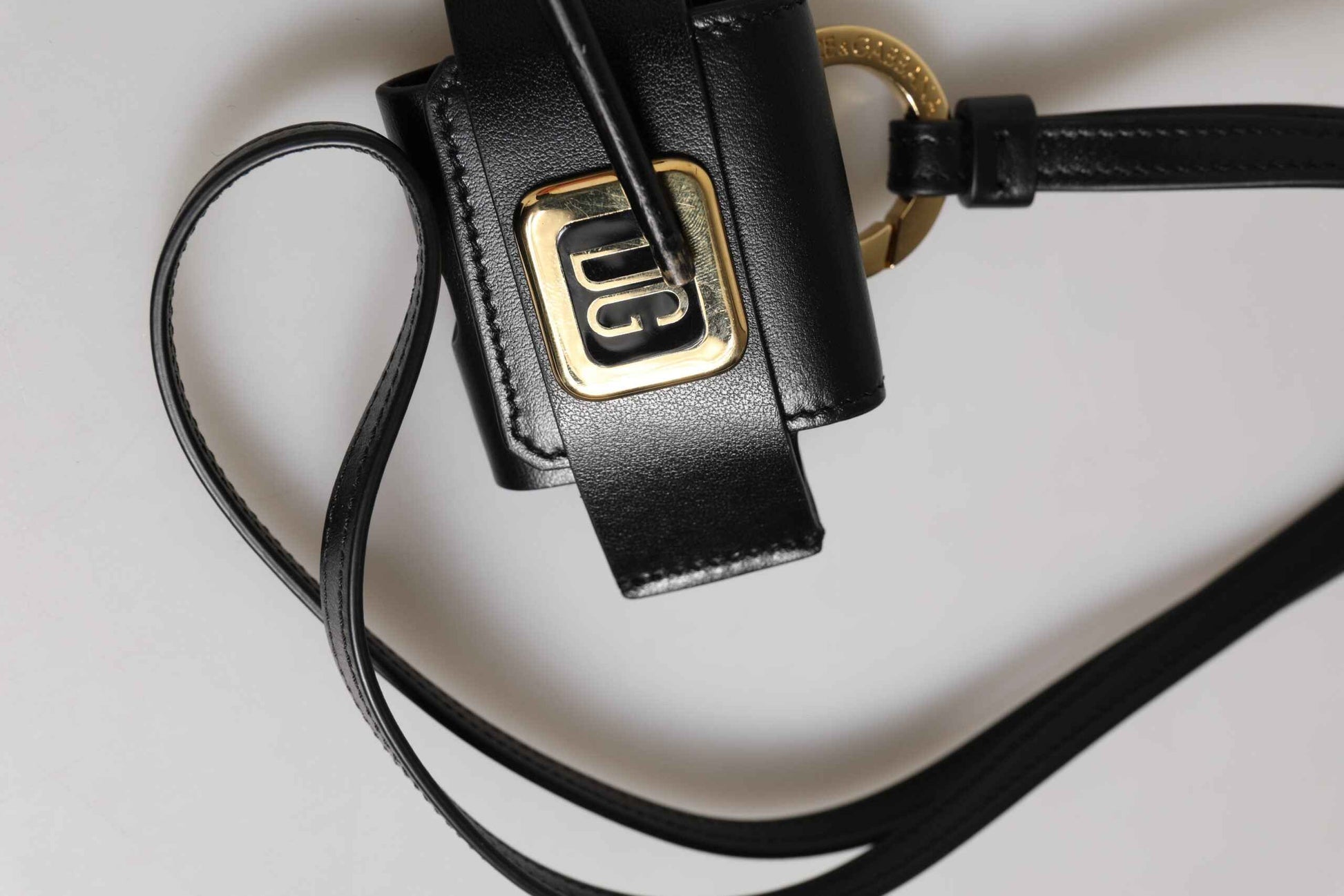 Dolce & Gabbana Black Leather Strap Gold Metal DG Logo Plaque Airpods Case by Dolce & Gabbana