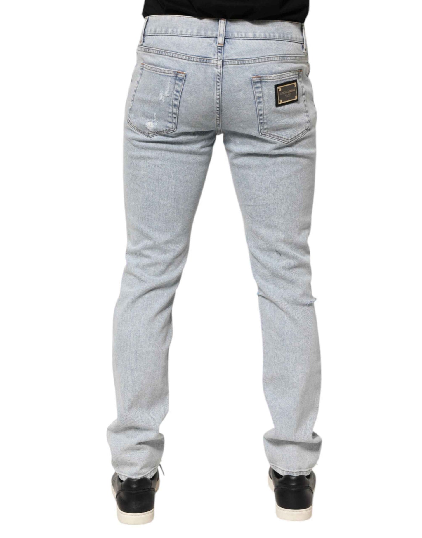 Dolce & Gabbana Light Blue Distressed Slim Fit Ripped Denim Jeans by Dolce & Gabbana