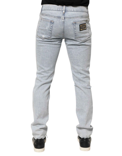 Dolce & Gabbana Light Blue Distressed Slim Fit Ripped Denim Jeans by Dolce & Gabbana