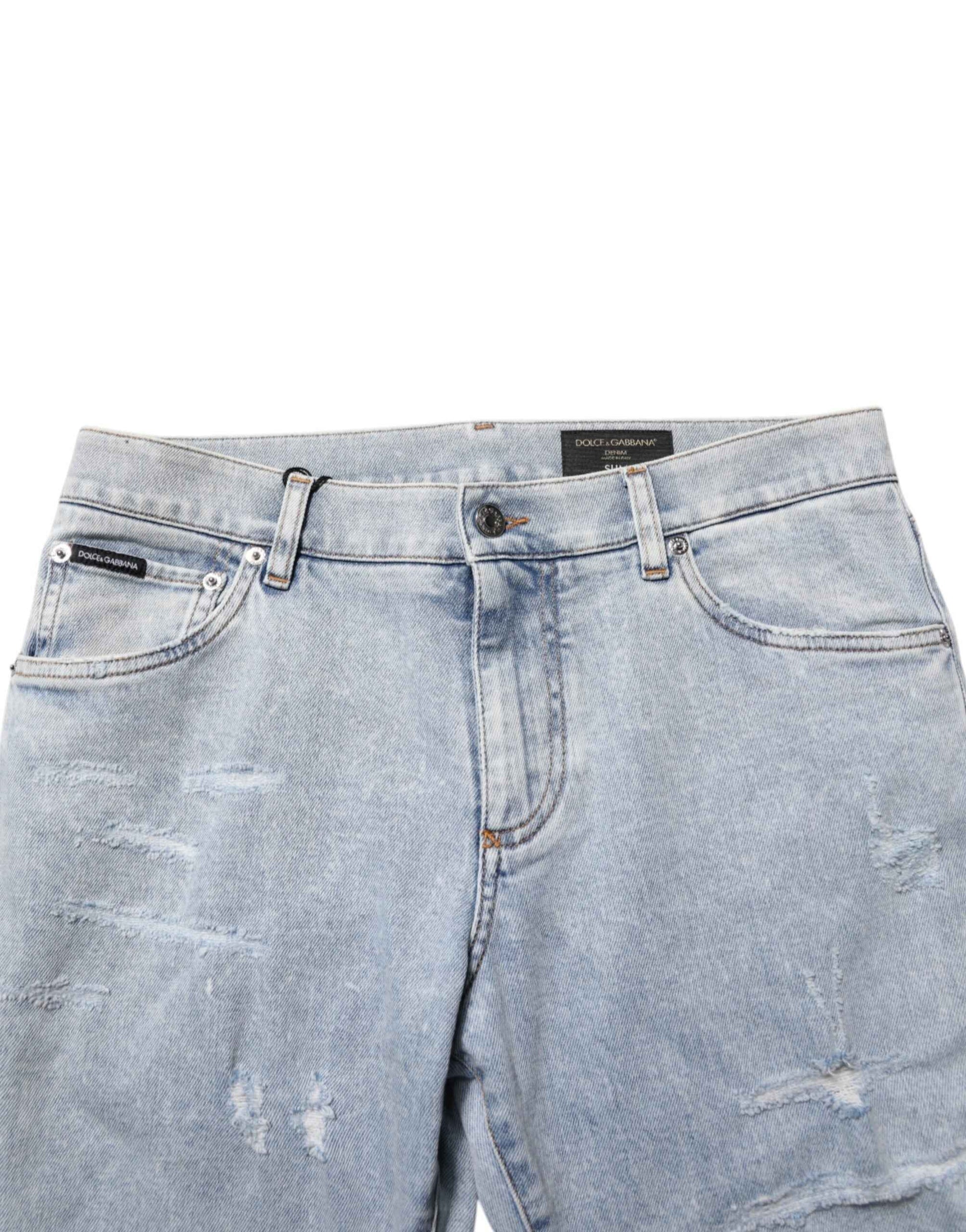 Dolce & Gabbana Light Blue Distressed Slim Fit Ripped Denim Jeans by Dolce & Gabbana