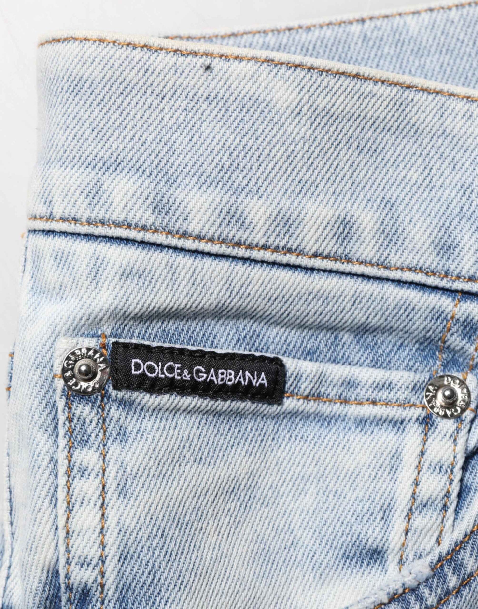 Dolce & Gabbana Light Blue Distressed Slim Fit Ripped Denim Jeans by Dolce & Gabbana
