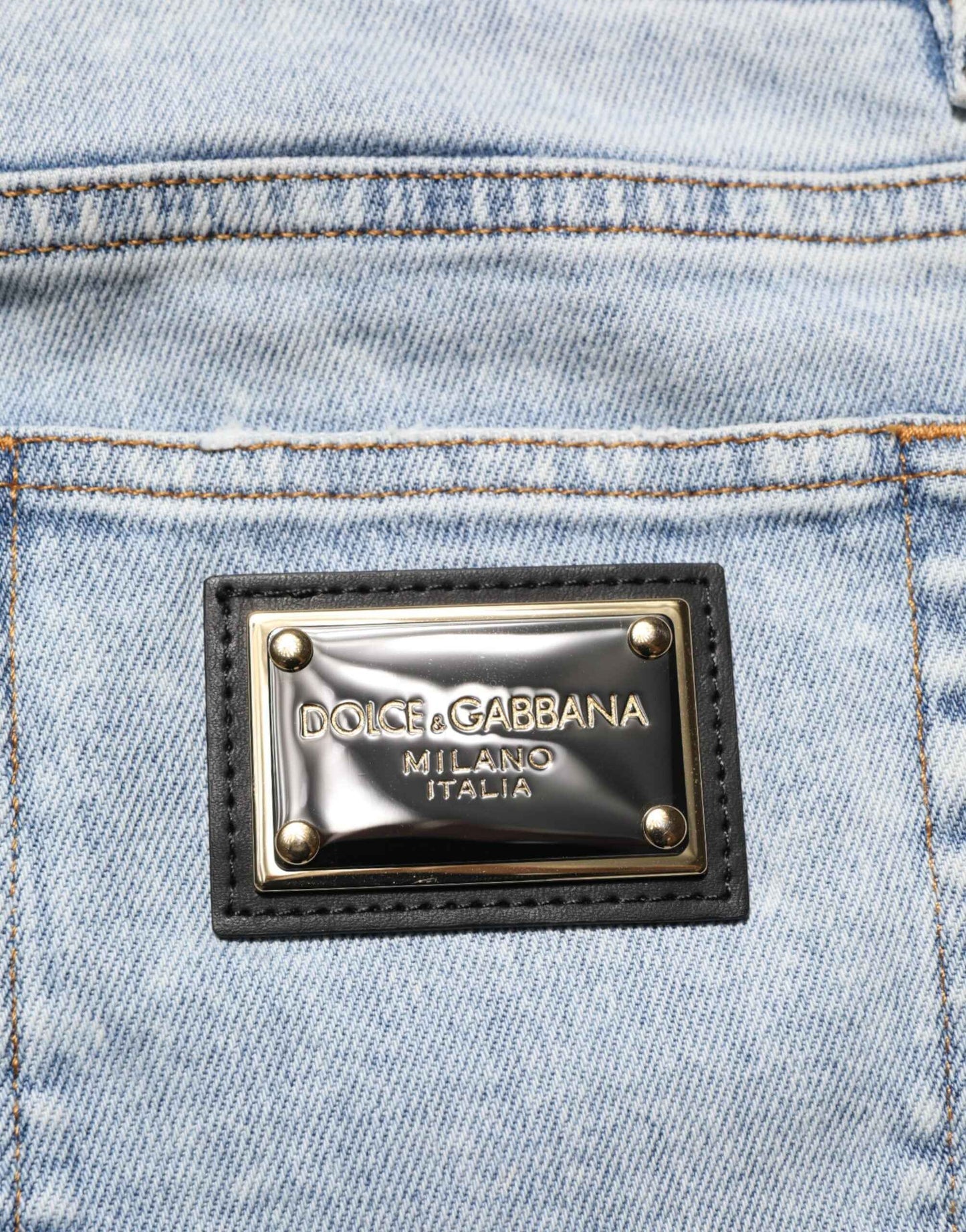 Dolce & Gabbana Light Blue Distressed Slim Fit Ripped Denim Jeans by Dolce & Gabbana